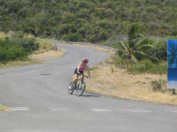 Female participant on bike in the 2004 St Kitts Triathlon