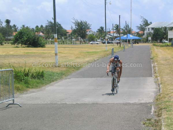 Male participant on bike in the 2004 St Kitts Triathlon