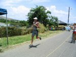 Olympic Male Champion in 2004 St Kitts Triathlon sprinting towards the finish line