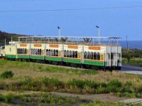 St. Kitts Scenic Railway Sugar Train alongside platform at Golden Rock