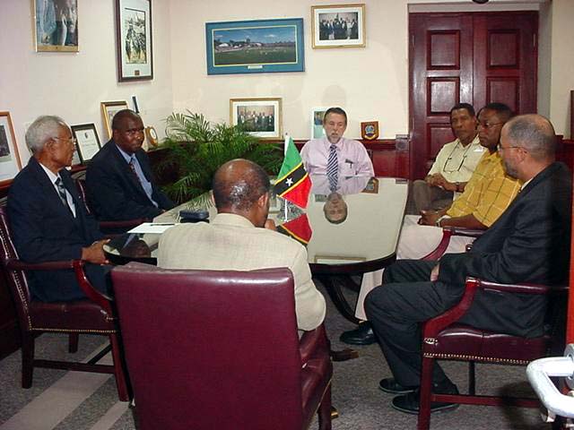 Prime Minister Douglas and Senator Richard Ricky Skerritt and St Kitts Nevis Cricket Officials with West Indies Cricket Board President Ken Gordon