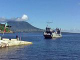 St Kitts and Nevis Sea Bridge Ferry approaching pier at Majors Bay. Nevis Peak is in the background.