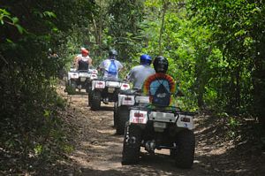 Riding in the rainforest on St Kitts quad bike tour