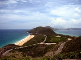 St Kitts tours and Island Safaris with Captain Sunshine Tours. St Kitts photo of Captain Sunshine Tours St Kitts Panoramic Tour showing the Southeast peninsula as seen from the Timothy Hill lookout point with views of the Atlantic Ocean and the Caribbean Sea .