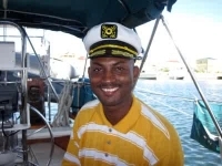 St Kitts tours and Island Safaris with Captain Sunshine Tours. St Kitts photo of Captain Sunshine tour guide Kenny aka Smiling Kenny.