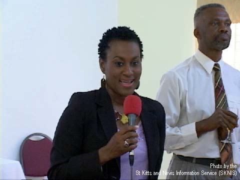 St Kitts and Nevis Minister of Sports Honourable Jacinth Henry Martin congratulating the St Kitts Nevis 2007 Cricket World Cup Bid Committee. Next to her is Permanent Secretary in the Ministry of Sports, Lloyd Lazaar.