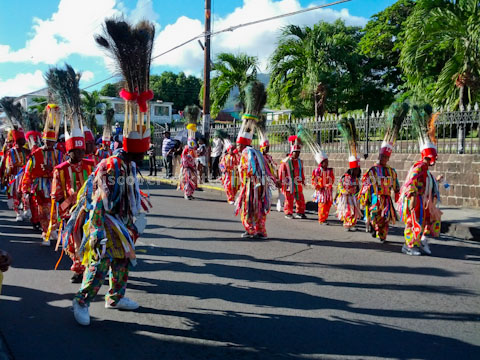 St Kitts masquerades performing during the Grand Carnival Parade for Sugar Mas 41 on New Years Day 2013
